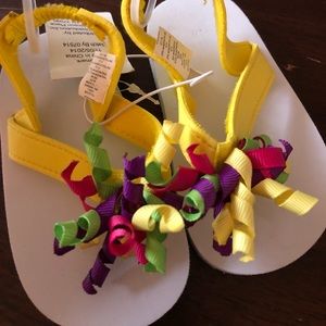NWT Pretty little flip flops 9-12 months